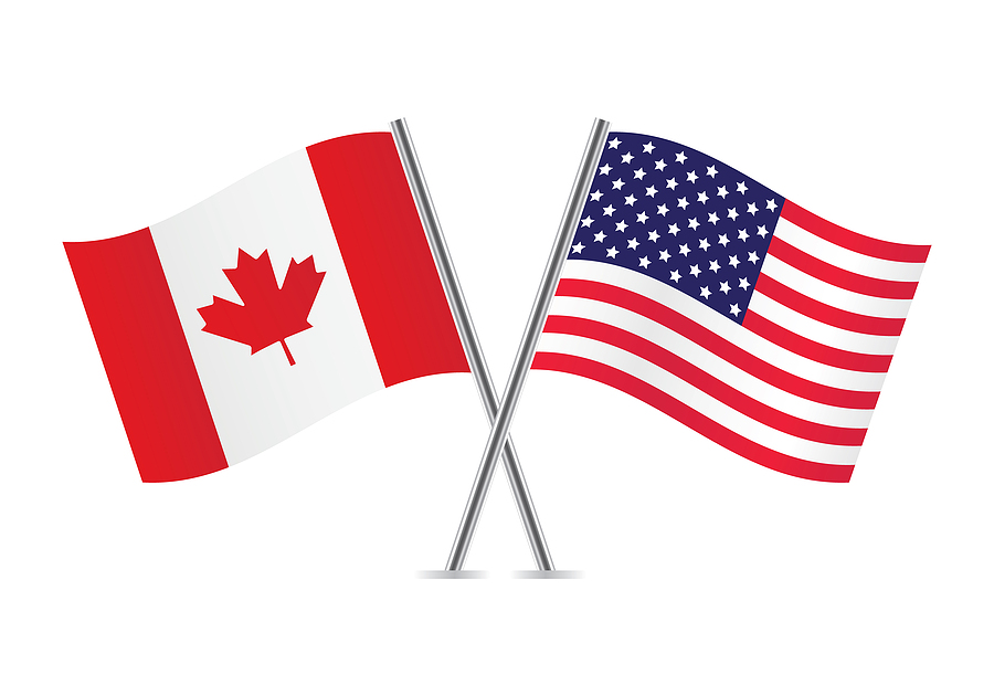 American and Canadian flags . Vector illustration.