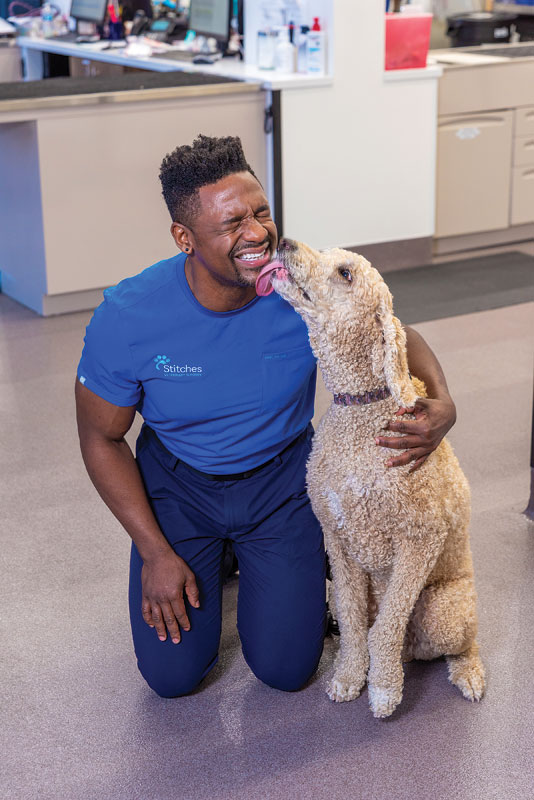 dog licking man